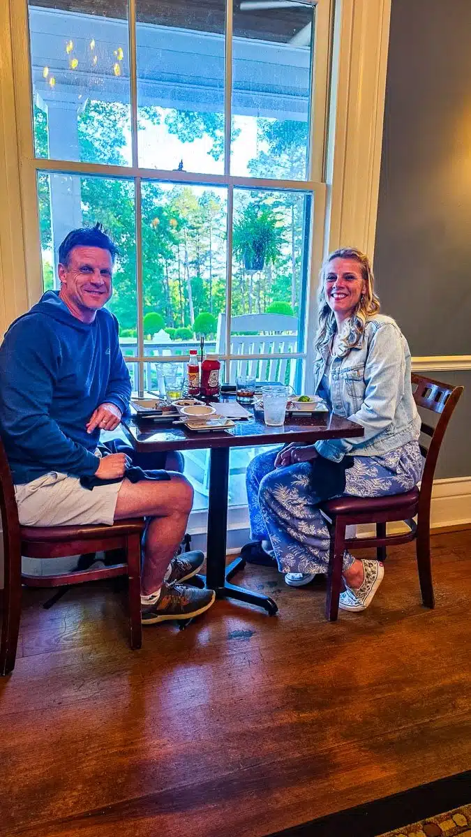 couple sitting at table at oak tavern