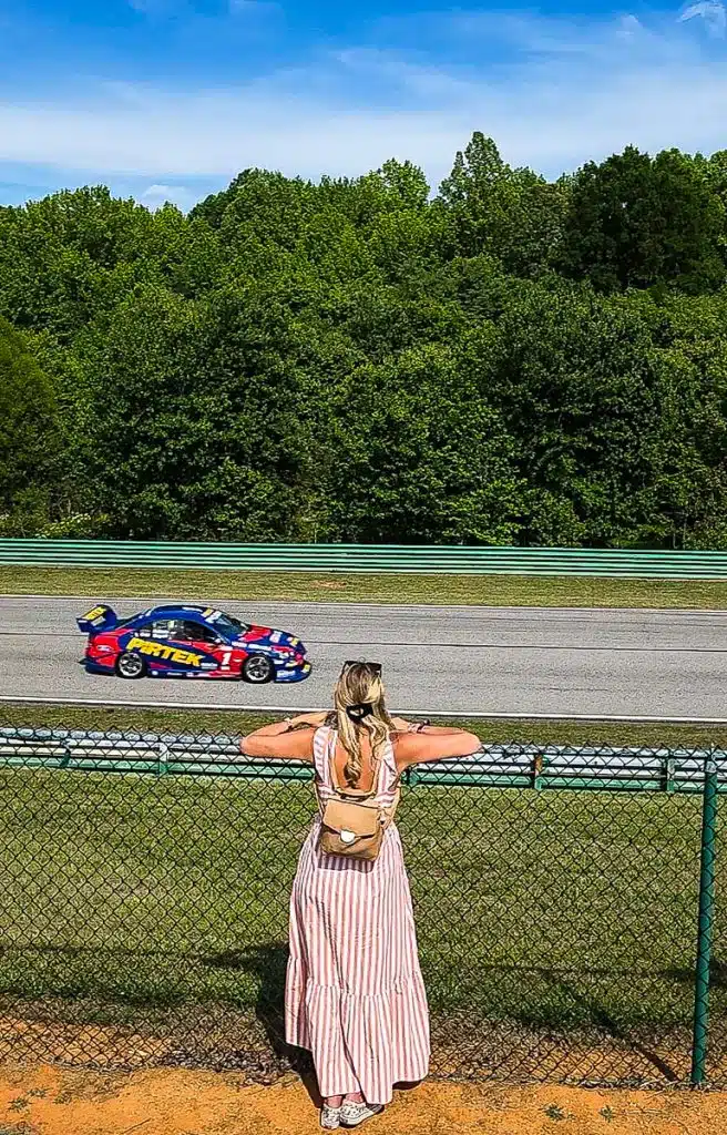 woman watching car race by at VIR