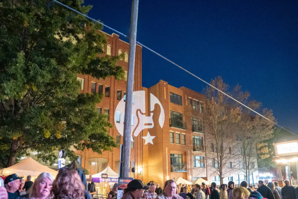 people enjoying band together festival