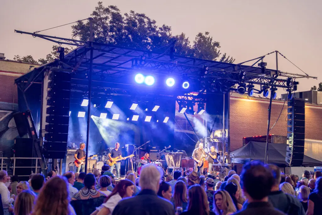 people at band together concert