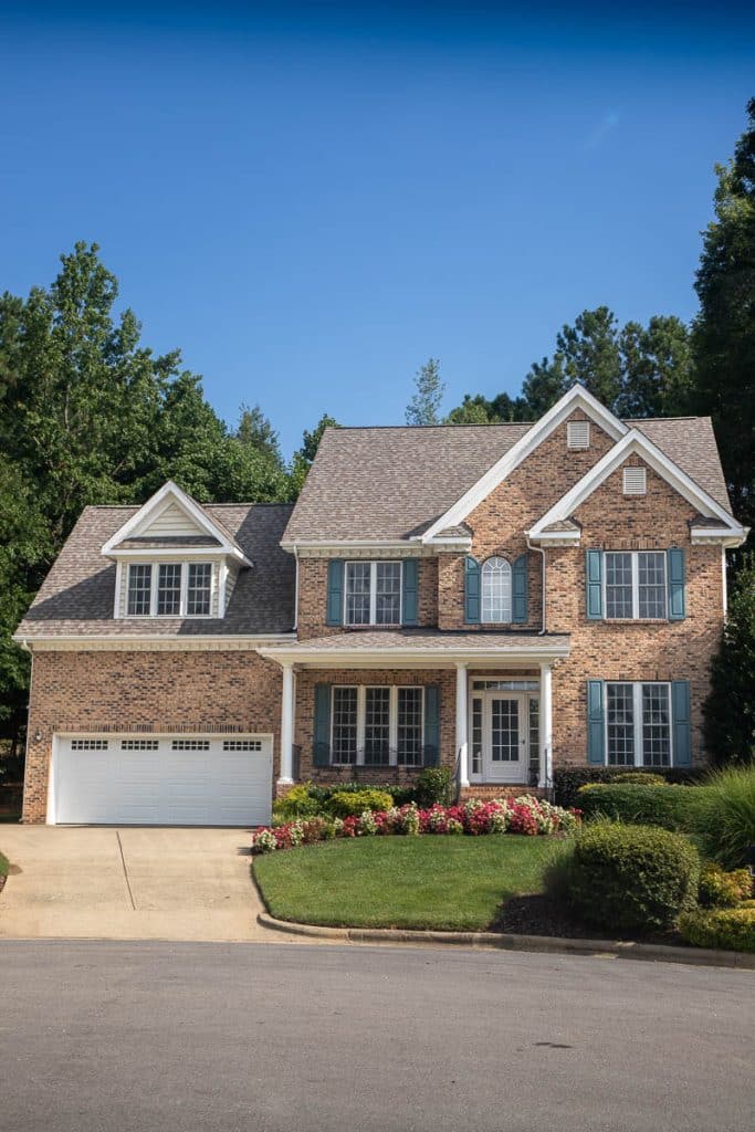 A two-story brick home in Cary, North Carolina.