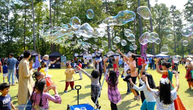 people with bubbles at diwali 768x440