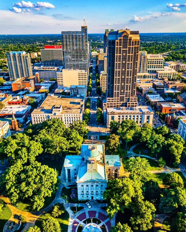 Raleigh is called the "City of Oaks" for a reason. Looking south from my drone over the State Capitol Building and Fayetteville Street.

I love how the Capitol is surrounded by magnificent oaks and is the bookend to one end of Fayetteville with the skyline in front of it.

The view is great from ground level, but I always enjoy this perspective from 300ft above.

#ThisIsRaleigh #raleighskyline #raleighdowntown #raleighphotography #downtownraleighnc #visitraleigh #raleighnorthcarolina #raleighphotographers