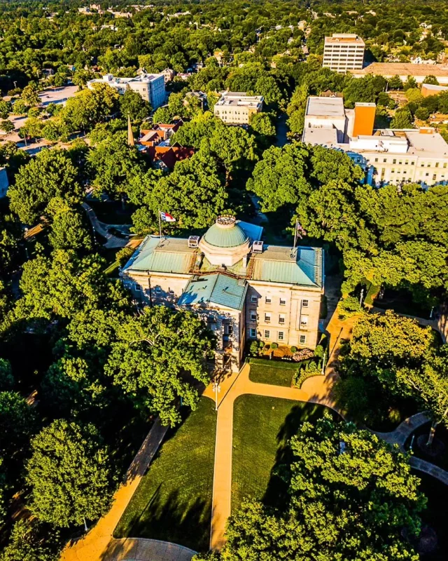 Why is Raleigh called the "City of Oaks?" Well, here's your state capitol building from my drone surrounded by magnificent oaks. 

And it doesn't end here. Love all the tree lined streets around Raleigh. But not only the oaks, the pine forest neighborhoods, the magnolia trees. Love them all.

#ThisIsRaleigh #raleighdowntown #raleighphotographers #visitraleigh #raleighnorthcarolina #dtraleigh #raleigharchitecture